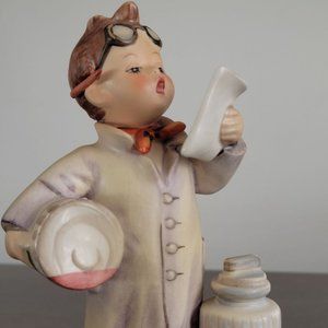 Vintage Hummel  "Doctor" Reading Receipt While Spilling Liquid